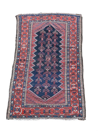 Lot 474 - A Caucasian dagestan blue ground rug