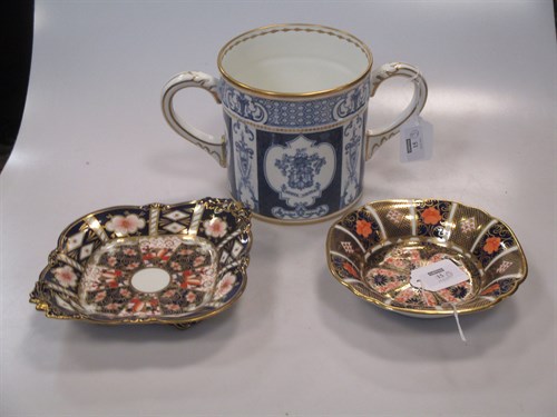 Lot 15 - A Royal Crown Derby two handled loving cup...