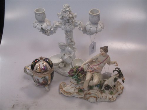 Lot 25 - A pair of continental porcelain white glazed...