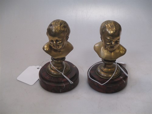 Lot 34 - A pair of French gilt bronze busts depicting a...