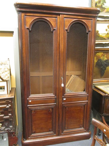 Lot 372 - A French mahogany armoire with wire doors 238...