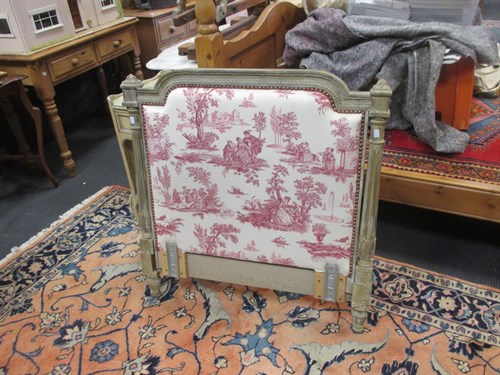 Lot 702 - An upholstered French single bed headboard