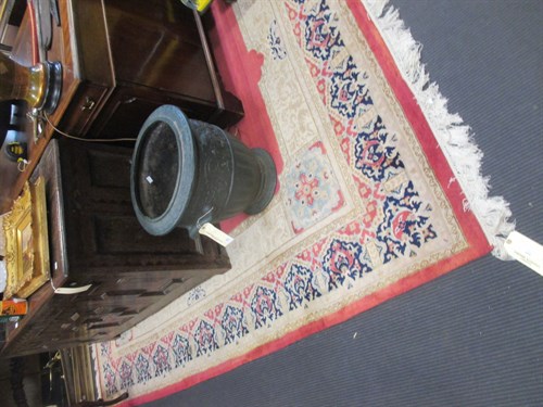 Lot 471 - Two pink ground wool carpets, Persian design,...