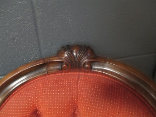Lot 673 - A Victorian Rosewood settee, upholstered in...