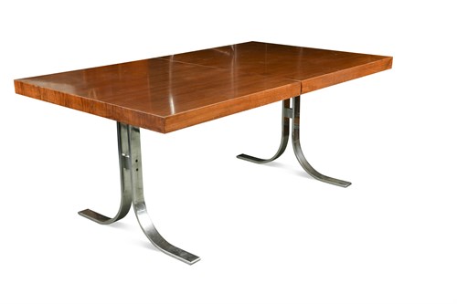 Lot 223 - Attributed to Milo Baughman, a rosewood and chrome extending table