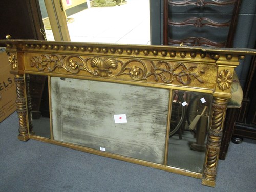 Lot 663 - A Regency gilt framed triple plate overmantle...