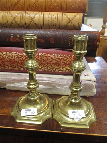Lot 607 - Pair of Georgian brass candlesticks, 18cm high