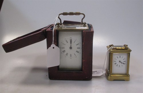 Lot 35 - A gilt brass carriage timepiece with white...