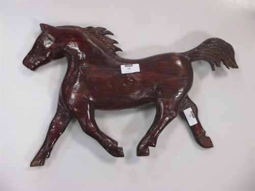 Lot 15 - A modern carved stained pine model of a horse