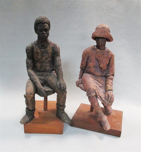 Lot 144 - J D Palmer, a stoneware figure of a seated woman on wooden plinth