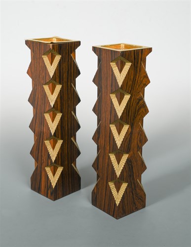 Lot 204 - Stuart Devlin, (Australian, born 1931), a pair of Indian rosewood and parcel gilt candlesticks