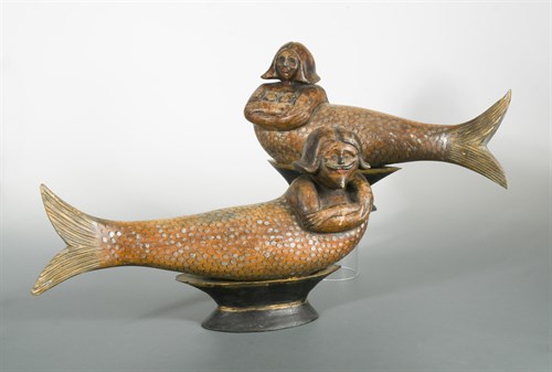 Lot 143 - John Collier (British, 20th Century), a pair of carved and decorated figures of a mermaid and merman