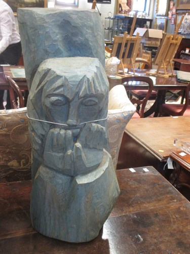 Lot 86 - A carved and stained pine totem figure, signed...