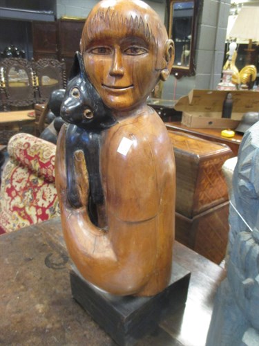 Lot 87 - A carved and part ebonised hardwood bust of a...