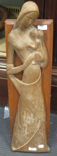 Lot 18 - A carved oak figure of Madonna and child in...
