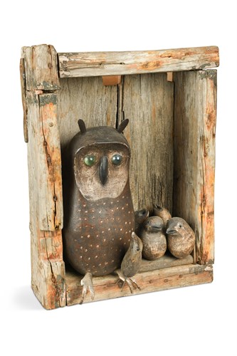 Lot 142 - In the manner of Guy Taplin, a carved and painted wood model of an Owl feeding her chicks