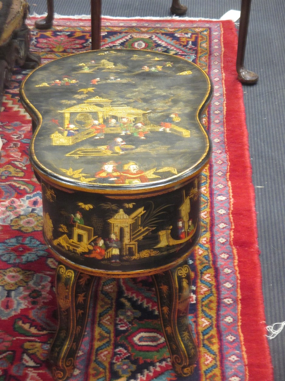 Lot 380 - A black lacquered and Chinioserie decorated...