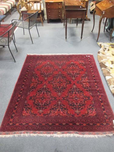 Lot 475 - A large red Bilicik rug, 190 x 154cm