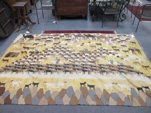 Lot 744 - A large Egyptian pictorial kilim with people,...
