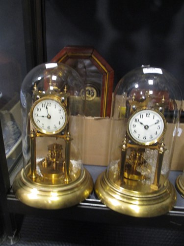 Lot 75 - Three anniversary clocks with domes, various...