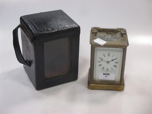 Lot 14 - A basic French brass carriage timepiece, with...