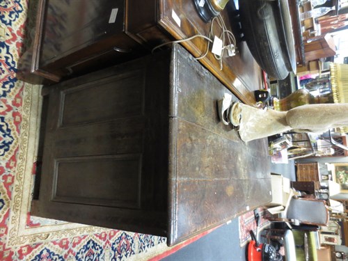 Lot 556 - A 17th century oak and banded panelled coffer...