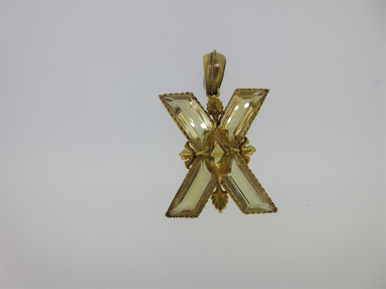 Lot 7 - A Victorian St Andrew's cross pendant set with citrines