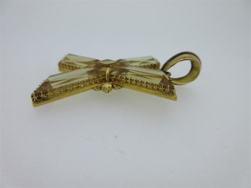 Lot 7 - A Victorian St Andrew's cross pendant set with citrines