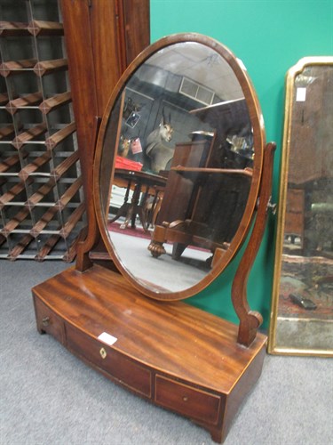 Lot 686 - An early 19th century mahogany bow fronted...