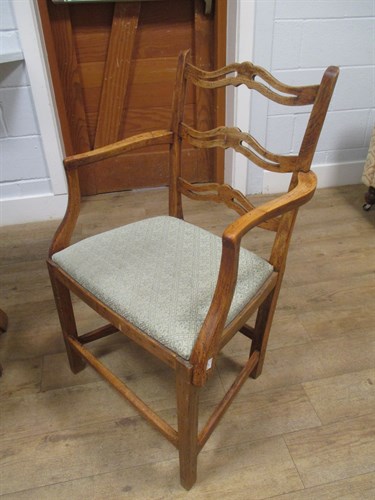 Lot 658 - A George III mahogany camel back armchair...