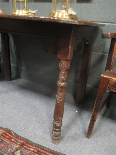 Lot 671 - A 17th century oak side table with turned...