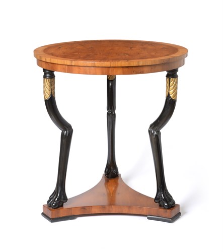 Lot 262 - A pair of Biedermeier style yewwood and kingwood veneered and crossbanded tripod centre tables