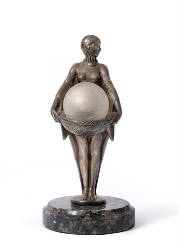 Lot 128 - Max Le Verrier (French, 1892-1973), an Art Deco silvered metal figural table lamp, circa 1925