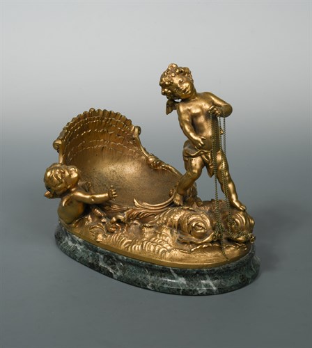 Lot 374 - After Auguste Louis Marthurin Moreau (French 1834-1917), a gilt bronze bonbonniere modelled as a Cherub in a shell-shaped carriage
