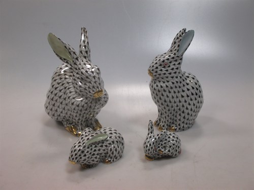 Lot 261 - Herend: four porcelain rabbit figurines of...