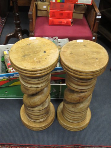 Lot 610 - A pair of turned wood pedestals togeather with...