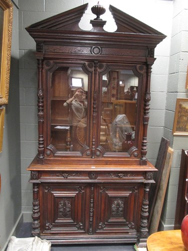Lot 628 - A late 19th century oak glazed book case...