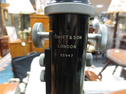 Lot 116 - A Swift and Son binocular compound microscope...