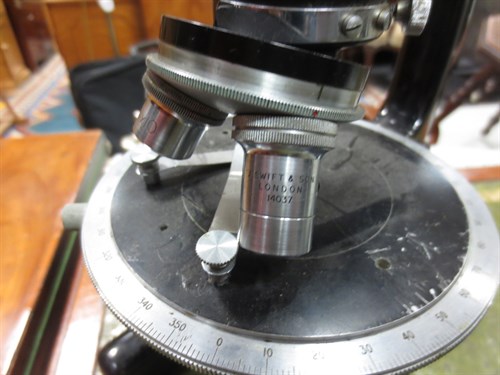 Lot 116 - A Swift and Son binocular compound microscope...