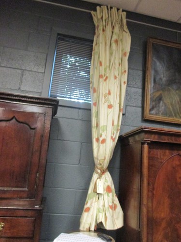 Lot 720 - A pair of lined cream coloured curtains, 226cm...
