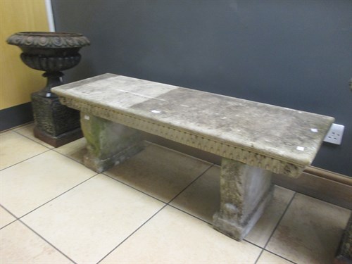 Lot 735 - A stone garden bench