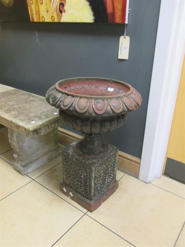 Lot 736 - A pair of cast iron urns on stands a/f