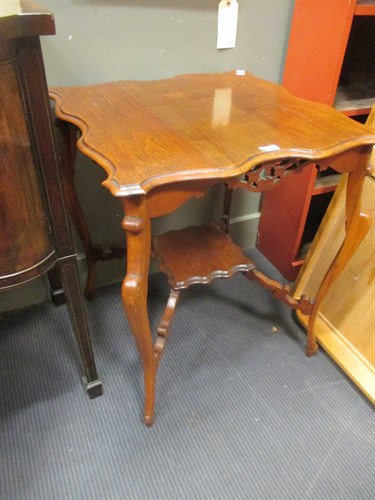 Lot 374 - An Edwardian mahogany occasional table