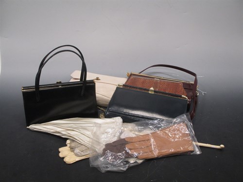 Lot 334 - A French Lady's cream silk parasol together...