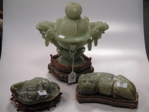 Lot 79 - A modern green Jadeite censer on hard wood...