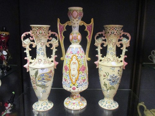 Lot 59 - A pair of Fischer vases and another (3)
