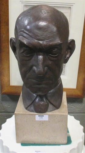 Lot 150 - M Crossley, a bronze head of a man, signed and...