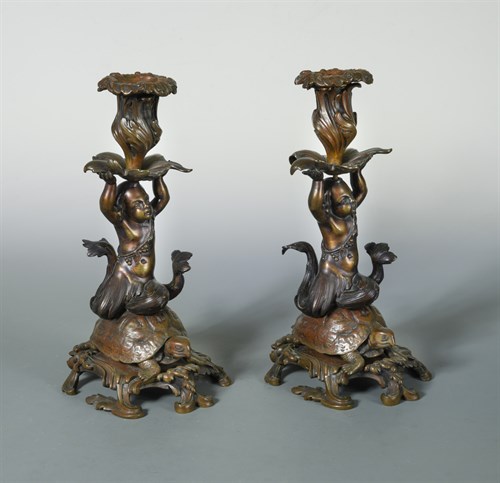 Lot 347 - A pair of 19th century bronze candlesticks