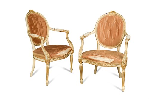 Lot 554 - A pair of George III painted and parcel gilt salon chairs