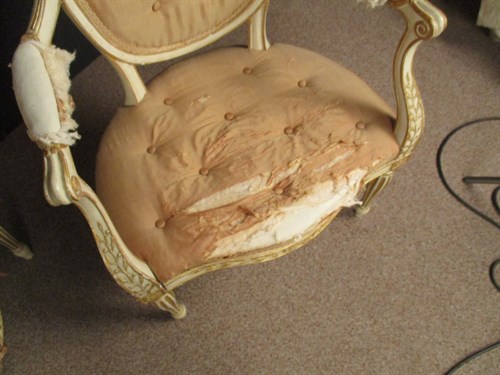 Lot 554 - A pair of George III painted and parcel gilt salon chairs